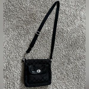 Black Coach crossbody purse in signature canvas